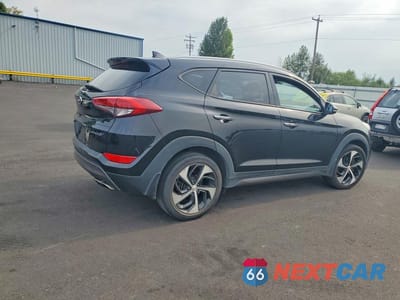 Trzecie zdjęcie samochodu z tyłu: 2016 HYUNDAI TUCSON LIMITED VIN:KM8J33A29GU080748 - miniatura