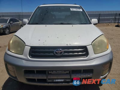 Piąte zdjęcie samochodu w środku: 2001 TOYOTA RAV4 BASE VIN:JTEGH20V110020396 - miniatura