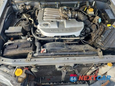 Zdjęcie 11 z 12 samochodu: 2004 NISSAN PATHFINDER SE VIN:JN8DR09X34W803707 - miniatura