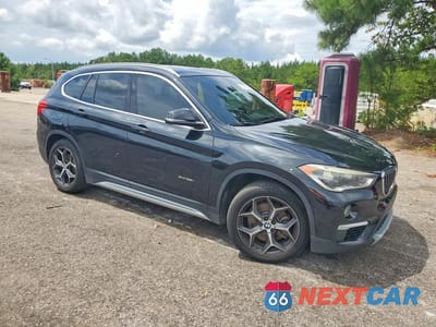 Czwarte zdjęcie samochodu z boku: 2016 BMW X1 XDRIVE28I VIN:WBXHT3Z31G4A48138 - miniatura