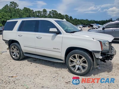 Czwarte zdjęcie samochodu z boku: 2015 GMC YUKON DENALI VIN:1GKS1CKJ1FR528619 - miniatura