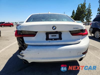 Zdjęcie 6 z 12 samochodu: 2019 BMW 330I VIN:WBA5R1C57KAJ99390 - miniatura