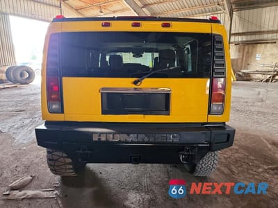 Zdjęcie 6 z 12 samochodu: 2004 HUMMER H2 VIN:5GRGN23U14H121832 - miniatura