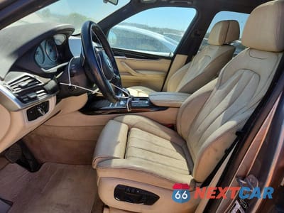 Zdjęcie 7 z 12 samochodu: 2014 BMW X5 XDRIVE35I VIN:5UXKR0C55E0H20344 - miniatura