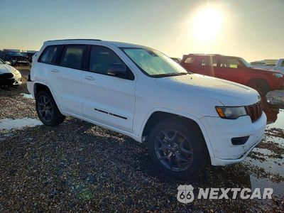 Czwarte zdjęcie samochodu z boku: 2021 JEEP GRAND CHEROKEE LIMITED VIN:1C4RJFBG8MC674922 - miniatura