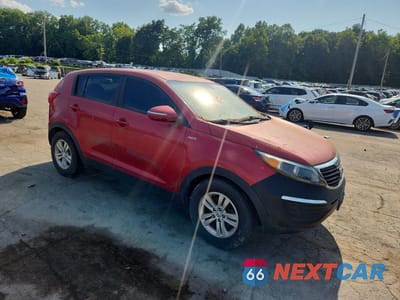 Czwarte zdjęcie samochodu z boku: 2011 KIA SPORTAGE LX VIN:KNDPBCA26B7098570 - miniatura