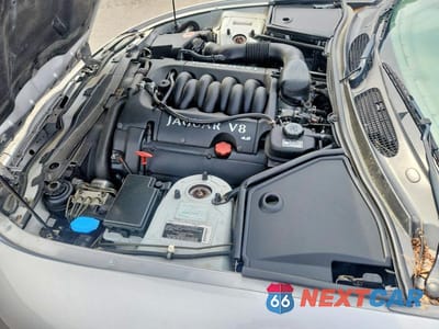 Zdjęcie 11 z 12 samochodu: 2001 JAGUAR XK8 VIN:SAJDA42C41NA19401 - miniatura