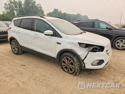 Czwarte zdjęcie samochodu z boku: 2017 FORD ESCAPE SE VIN:1FMCU0GD5HUC22687 - miniatura