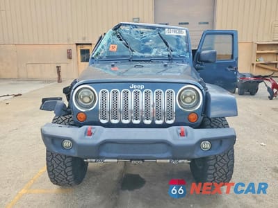 Piąte zdjęcie samochodu w środku: 2007 JEEP WRANGLER SAHARA VIN:1J4GB59177L199570 - miniatura