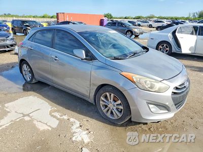 Czwarte zdjęcie samochodu z boku: 2013 HYUNDAI ELANTRA GT BASE VIN:KMHD35LEXDU125420 - miniatura