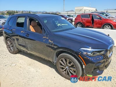 Czwarte zdjęcie samochodu z boku: 2023 BMW X5 XDRIVE45E VIN:5UXTA6C01P9P60130 - miniatura