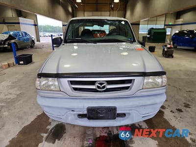 Piąte zdjęcie samochodu w środku: 2002 MAZDA B3000 CAB PLUS VIN:4F4ZR17U42TM17433 - miniatura