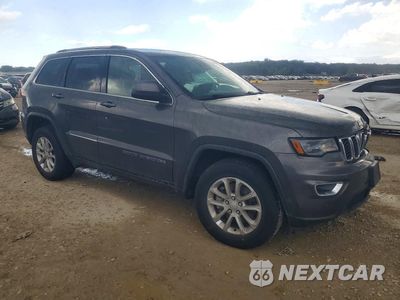 Czwarte zdjęcie samochodu z boku: 2021 JEEP GRAND CHEROKEE LAREDO VIN:1C4RJFAG8MC530708 - miniatura