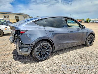 Trzecie zdjęcie samochodu z tyłu: 2023 TESLA MODEL Y VIN:7SAYGDEE4PA077685 - miniatura