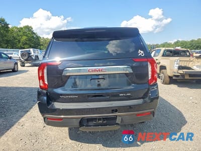 Zdjęcie 6 z 13 samochodu: 2021 GMC YUKON VIN:1GKS2AKD0MR444493 - miniatura