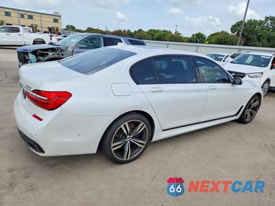 Trzecie zdjęcie samochodu z tyłu: 2019 BMW 750 I VIN:WBA7F0C56KGM25864 - miniatura