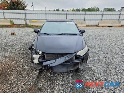Piąte zdjęcie samochodu w środku: 2010 HONDA INSIGHT EX VIN:JHMZE2H70AS028469 - miniatura