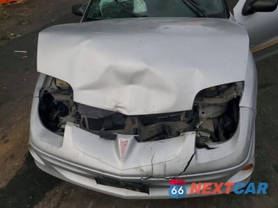 Zdjęcie 11 z 12 samochodu: 2002 PONTIAC SUNFIRE SE VIN:1G2JB524927178029 - miniatura