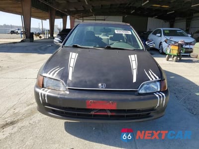 Piąte zdjęcie samochodu w środku: 1995 HONDA CIVIC LX VIN:JHMEG865XSS030924 - miniatura