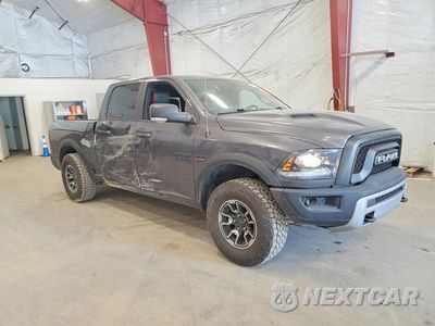 Czwarte zdjęcie samochodu z boku: 2016 RAM 1500 REBEL VIN:1C6RR7YT0GS261056 - miniatura
