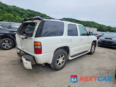 Trzecie zdjęcie samochodu z tyłu: 2003 GMC YUKON DENALI VIN:1GKEK63U13J281407 - miniatura