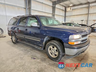 Czwarte zdjęcie samochodu z boku: 2002 CHEVROLET SUBURBAN K1500 VIN:3GNFK16Z62G252115 - miniatura