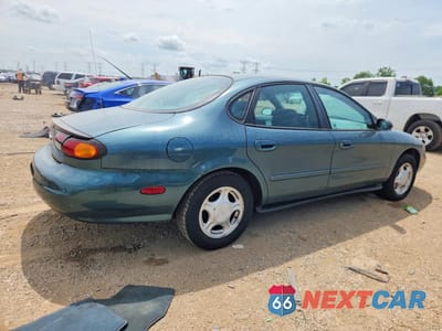 Trzecie zdjęcie samochodu z tyłu: 1997 FORD TAURUS GL VIN:1FALP52U3VG295556 - miniatura
