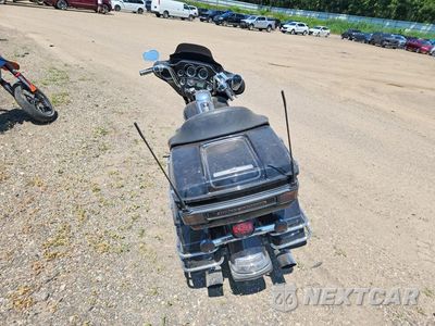 Czwarte zdjęcie samochodu z boku: 2011 HARLEY-DAVIDSON FLHTCU VIN:1HD1FC411BB638111 - miniatura