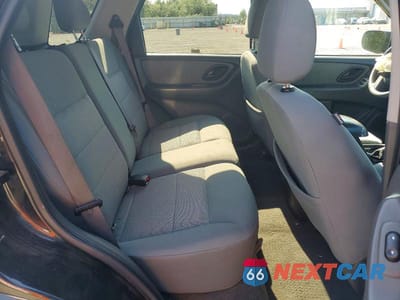 Zdjęcie 11 z 13 samochodu: 2007 FORD ESCAPE HEV VIN:1FMCU49H37KA03485 - miniatura