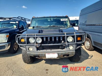 Piąte zdjęcie samochodu w środku: 2003 HUMMER H2 VIN:5GRGN23U03H132240 - miniatura