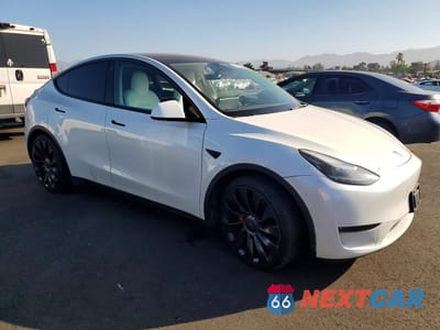 Czwarte zdjęcie samochodu z boku: 2022 TESLA MODEL Y VIN:7SAYGDEF9NF492722 - miniatura
