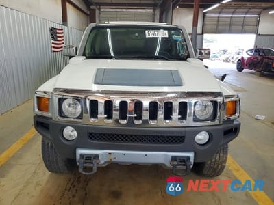 Piąte zdjęcie samochodu w środku: 2009 HUMMER H3 VIN:5GTEN13E798146732 - miniatura