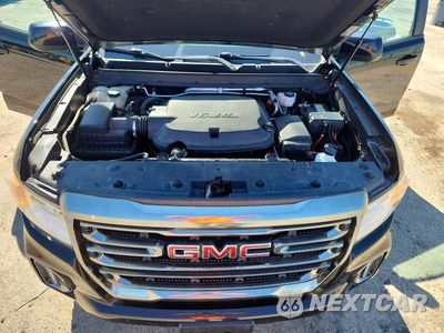 Zdjęcie 11 z 12 samochodu: 2021 GMC CANYON AT4 VIN:1GTG6FEN3M1218714 - miniatura