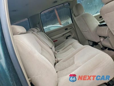 Zdjęcie 11 z 13 samochodu: 2004 CHEVROLET SUBURBAN C1500 VIN:3GNEC16Z84G259918 - miniatura