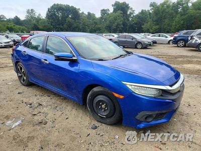 Czwarte zdjęcie samochodu z boku: 2017 HONDA CIVIC TOURING VIN:19XFC1F92HE013736 - miniatura