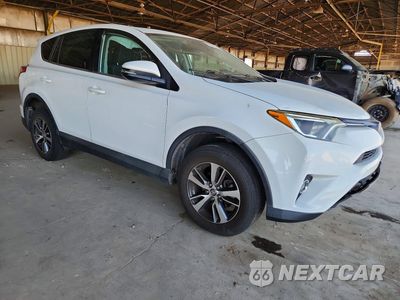 Czwarte zdjęcie samochodu z boku: 2018 TOYOTA RAV4 XLE VIN:2T3WFREV7JW473232 - miniatura