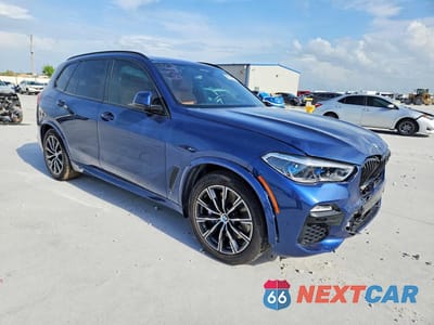Czwarte zdjęcie samochodu z boku: 2021 BMW X5 XDRIVE45E VIN:5UXTA6C03M9F96619 - miniatura