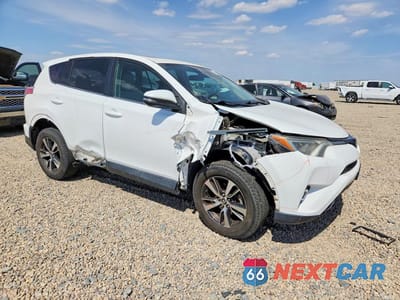 Czwarte zdjęcie samochodu z boku: 2018 TOYOTA RAV4 XLE VIN:2T3WFREV0JW411946 - miniatura