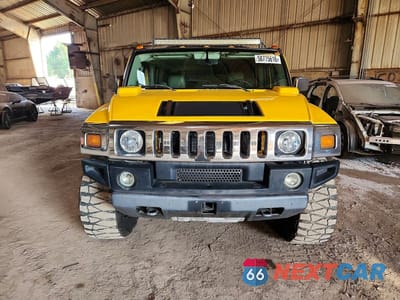 Piąte zdjęcie samochodu w środku: 2004 HUMMER H2 VIN:5GRGN23U14H121832 - miniatura