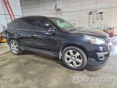 Czwarte zdjęcie samochodu z boku: 2017 CHEVROLET TRAVERSE LT VIN:1GNKVGKD9HJ102848 - miniatura