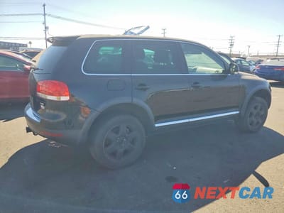 Trzecie zdjęcie samochodu z tyłu: 2004 VOLKSWAGEN TOUAREG TDI 5.0 VIN:WVGPZ77L04D086515 - miniatura