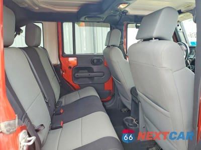 Zdjęcie 10 z 12 samochodu: 2009 JEEP WRANGLER UNLIMITED SAHARA VIN:1J8GA59189L778796 - miniatura