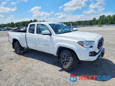 Czwarte zdjęcie samochodu z boku: 2022 TOYOTA TACOMA SR5 V6 VIN:3TYRZ5CN8NT020457 - miniatura