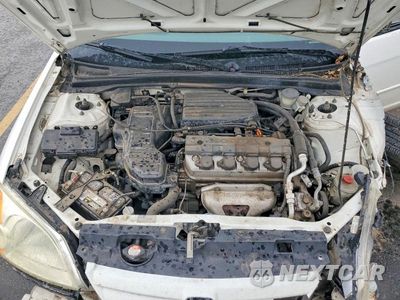 Zdjęcie 11 z 12 samochodu: 2001 HONDA CIVIC LX VIN:1HGES15531L060429 - miniatura