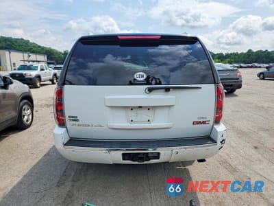 Zdjęcie 6 z 13 samochodu: 2011 GMC YUKON XL DENALI VIN:1GKS2MEFXBR105039 - miniatura