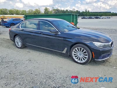 Czwarte zdjęcie samochodu z boku: 2016 BMW 740 I VIN:WBA7E2C50GGD99982 - miniatura