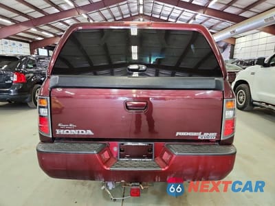 Zdjęcie 6 z 12 samochodu: 2007 HONDA RIDGELINE RTX VIN:2HJYK16387H521232 - miniatura
