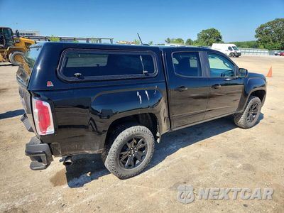 Trzecie zdjęcie samochodu z tyłu: 2021 GMC CANYON AT4 VIN:1GTG6FEN3M1218714 - miniatura