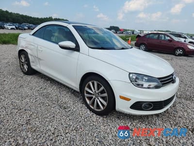 Czwarte zdjęcie samochodu z boku: 2013 VOLKSWAGEN EOS KOMFORT VIN:WVWBW8AH5DV006413 - miniatura