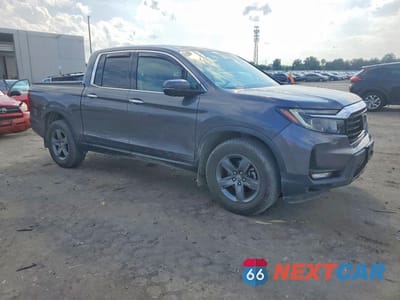 Czwarte zdjęcie samochodu z boku: 2021 HONDA RIDGELINE RTL VIN:5FPYK3F77MB020683 - miniatura